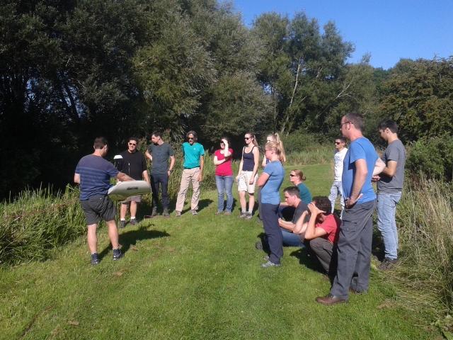 Delegates (including Amelia Astley) learning about riverine ADCP techniques alongside the River Test. 