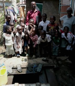 Villagers next to a well in Kisumu