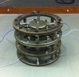 The assembled active isolator undergoing testing