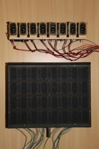 Line arrays used to increase speech intelligibility. The lower one is the newest version of radiator, aimed to reduce reflections from floor and ceiling.