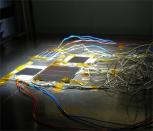 Fig. 2 - Various solar cells being tested with the light soaking device.
